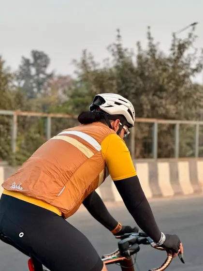 A rider seen from the back, showing off the classic cycling kit style popular in our group.