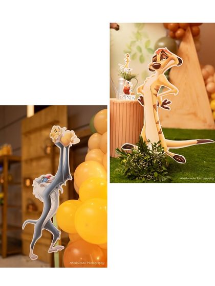 Iconic characters make the theme come alive. Here are our custom-made cutouts of Rafiki and Timon from The Lion King, placed strategically within the party setup.