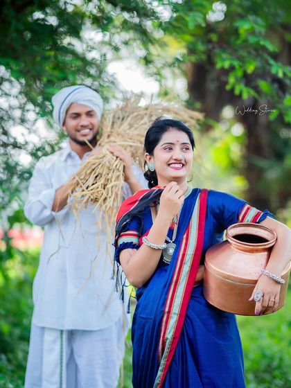A joyful, candid moment captured during a Shetkari themed shoot. Her bright smile and his happy glance create a photo that is full of life and positive energy.