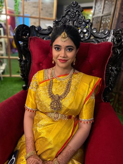 A classic portrait from the baby shower. The makeup is traditional and elegant, perfect for this important family function.