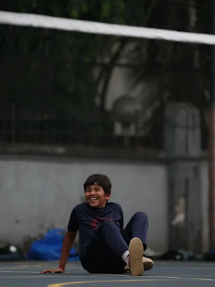 A moment of laughter and relaxation on the court. We work hard, but we also know how to have fun.