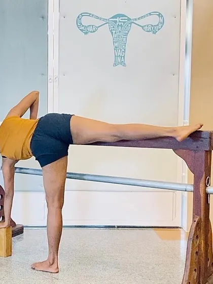 Supported asanas are not just for beginners. Using a prop like this bench in Ardha Chandrasana (Half Moon Pose) allows for a longer, more investigative hold. This helps us refine alignment and experience the therapeutic qualities of the pose more deeply.