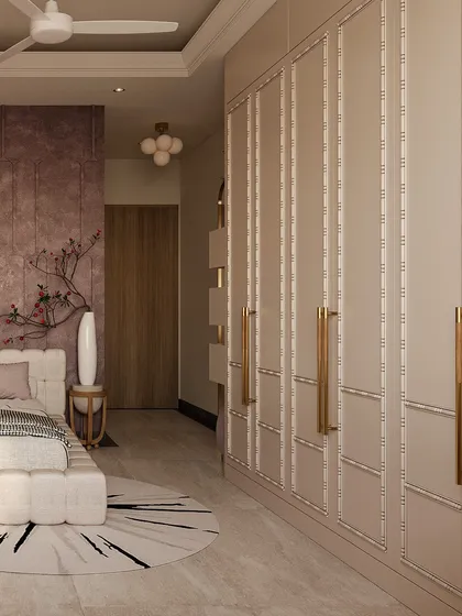 This guest bedroom is a study in softness, using a neutral base of creamy whites and elegant moldings. A gentle pop of lilac in the bed-back wall and window seating adds a touch of fresh, graceful personality.