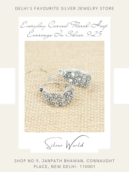 These everyday hoop earrings feature a beautifully carved floral pattern, adding a touch of subtle detail to a classic shape.