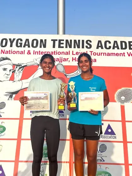 Abhilipsa Mallick and her partner with their winner's trophies from the Under-18 Doubles All India National Series in Haryana.