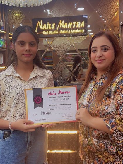 Meher, one of our younger students, proudly receives her certificate. We believe in empowering everyone with professional skills, regardless of age.