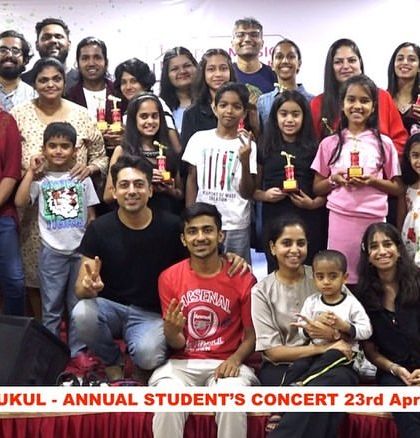 A group photo from our Annual Student's Concert. The joy and pride are palpable as students hold their trophies after conquering the stage.