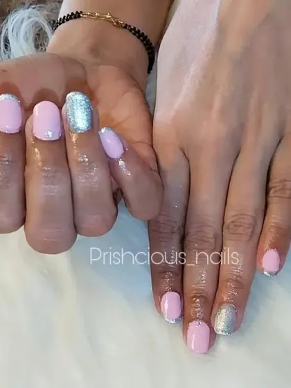 A different view of the simple pink and silver glitter manicure, a perfect choice for any special occasion where you want a touch of sparkle.