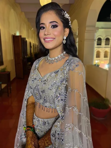 This gorgeous client is all dolled up for her cocktail and engagement ceremony. I gave her a smokey eye and a glowing complexion that looks stunning.