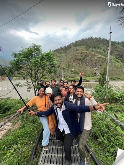The best selfies are the ones taken on a suspension bridge in Bhutan with your new travel squad. This is what it's all about: adventure, laughter, and making friends on the go.