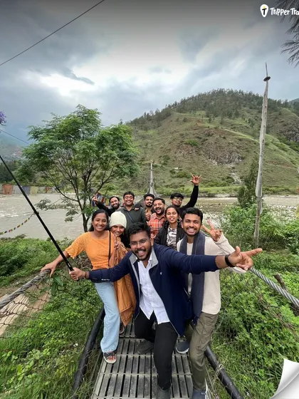 The best selfies are the ones taken on a suspension bridge in Bhutan with your new travel squad. This is what it's all about: adventure, laughter, and making friends on the go.