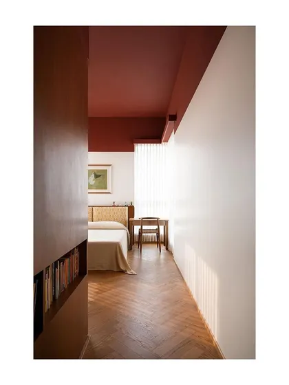 Another view of the kids' bedroom, highlighting the custom bed and headboard against the warm oak flooring. The design is meant to be a calm backdrop for sleep and play.