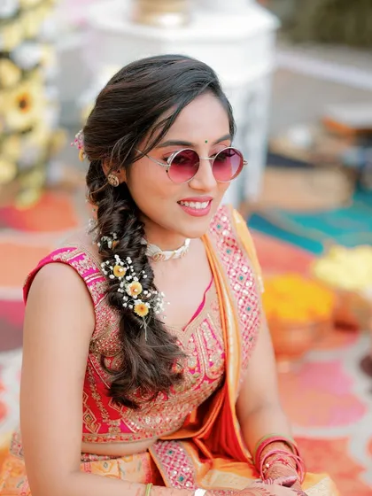Cool and chic for the Haldi ceremony. My bride Apurva pairs her traditional outfit with sunglasses for a fun, modern twist.