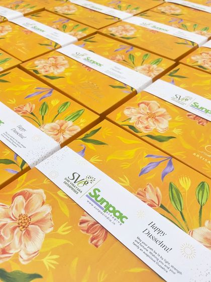 Festive corporate gifting made easy. These beautiful Dussehra gift boxes were customized with a branded sleeve for our client, Sunpac.