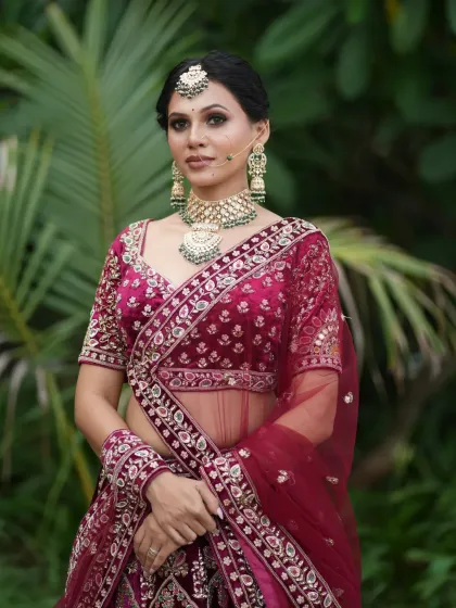A classic pose, with the bride looking elegant and poised.