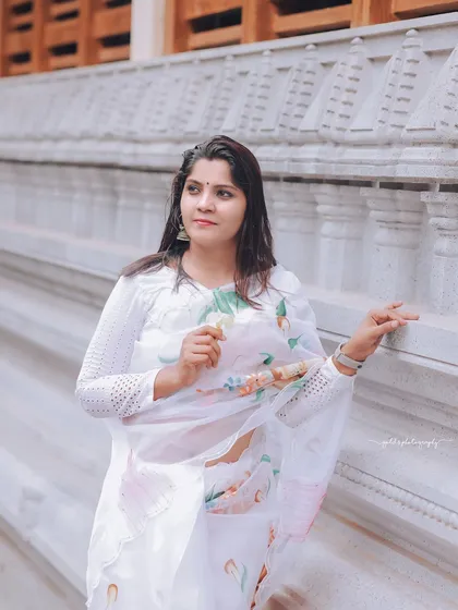 A simple and elegant portrait, with the bride looking away, creating a candid and natural feel.