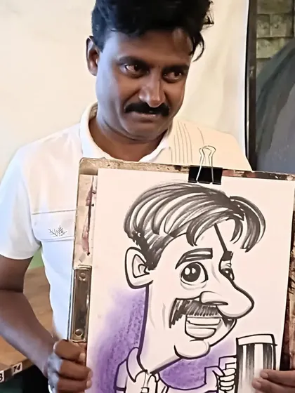 A guest enjoying a beer, a detail I included in his caricature.