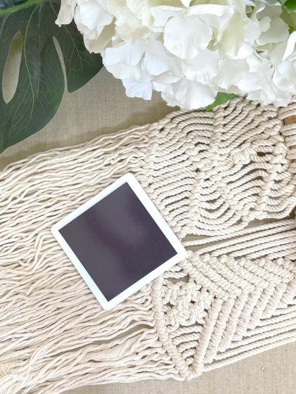 The back of my custom fridge magnets, showing the strong magnetic surface that will hold securely to your refrigerator.