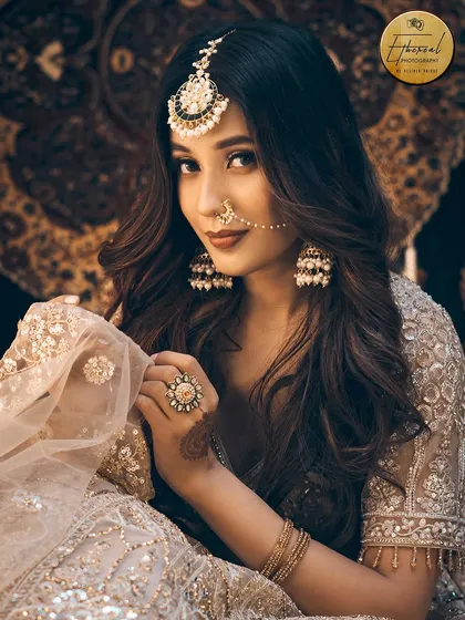 This shot captures a softer, more candid moment within the same Heeramandi theme. The delicate veil and gentle expression showcase the versatility I can bring to a single ethnic wear shoot.