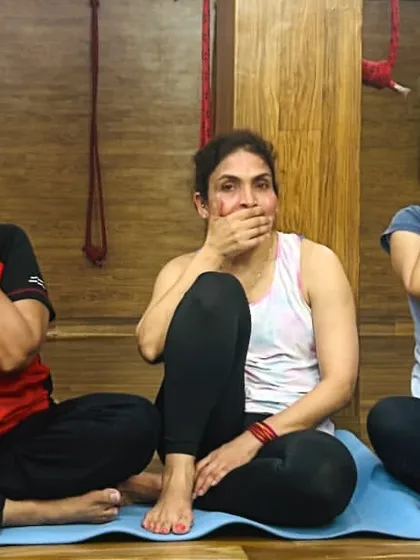 The three wise monkeys, yoga style. A playful moment of 'see no evil, speak no evil, hear no evil' during a studio session.