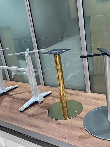 We import and stock a wide variety of table bases and stands. This allows our restaurant and cafe clients to mix and match, choosing from different materials like stainless steel, cast iron, and gold-plated finishes.