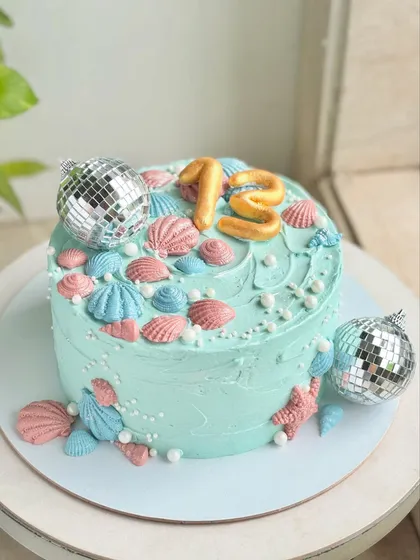 The full view of the mermaid disco cake, a fun and creative design for a 13th birthday party.