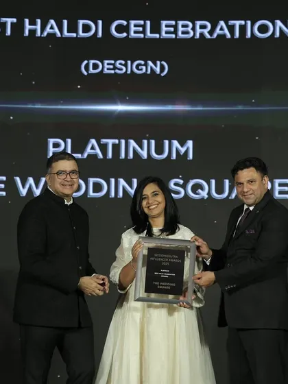 A proud moment, accepting the award for Best Haldi Celebration Design. I am so grateful for this recognition from WeddingSutra.