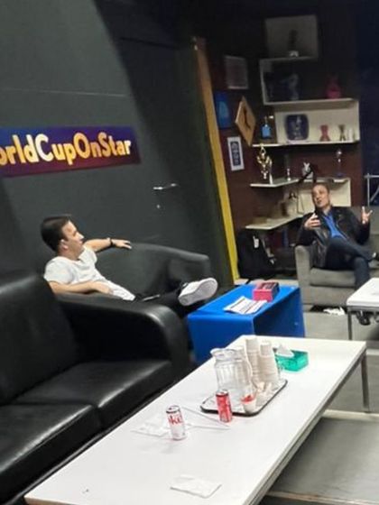 A candid moment of the cricket experts relaxing and enjoying a break at the Star Office during the World Cup.