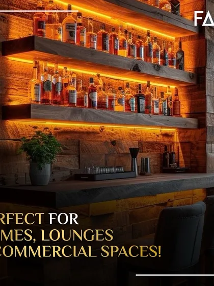 I love creating a warm, inviting glow. This rustic home bar design uses reclaimed wood panels and warm under-shelf LED lighting to create a cozy yet refined atmosphere. It’s the perfect spot for showcasing a whiskey collection and settling in for the evening.