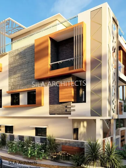 A different angle of the Chintamani residence, this view emphasizes the use of natural stone cladding and wood-finished elements to add texture and warmth to the modern structure.