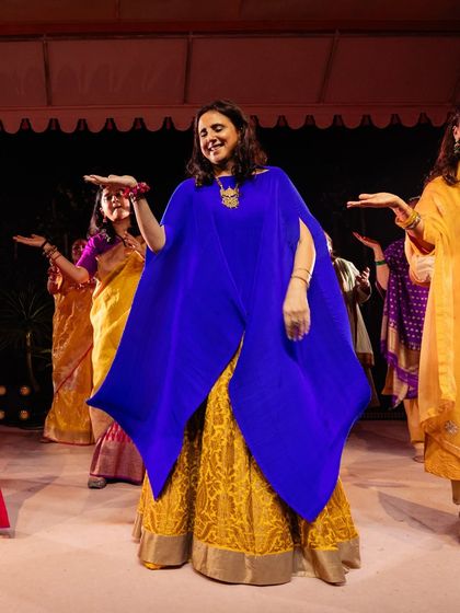 A single shot capturing the grace and joy of a family member dancing in celebration. It's moments like these that make a wedding performance so memorable.