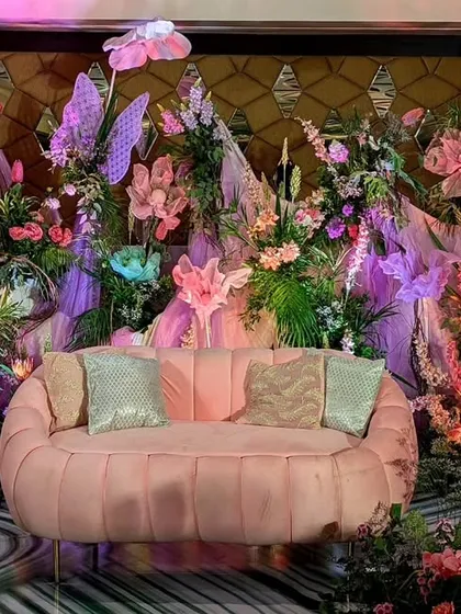 A Sangeet should feel like an enchanted garden. I used a palette of soft pinks, oversized butterflies, and whimsical florals to create this magical seating area, a perfect backdrop for a night of music and celebration.