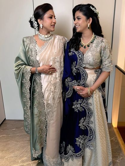 The mother and daughter together, both looking stunning with their perfectly coordinated makeup and outfits.