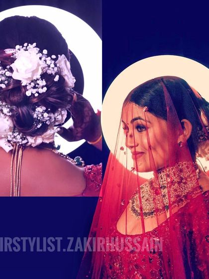 A creative shot of a bride with her floral bun, framed by a ring light. This highlights the artistry and drama of a classic bridal look.