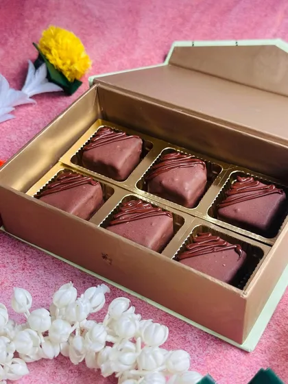 These Nutella Fudge Bites are a Diwali special. Each bite is a rich, creamy Nutella fudge wrapped in velvety chocolate, perfect for gifting or indulging.