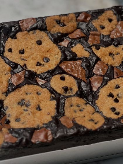 Another look at our famous Brookie. The contrast between the dark, fudgy brownie and the golden cookie topping is just so tempting.