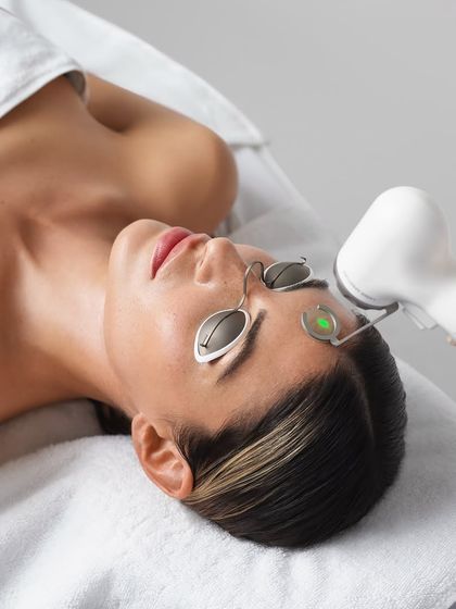 A patient undergoing the AdvaTx laser treatment. The protective eyewear and precise application demonstrate the safety protocols we follow to ensure an effective and comfortable experience.