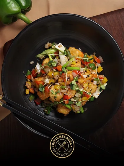 A healthy and colorful bowl of stir-fried prawns and diced vegetables, showcasing our ability to create dishes that are both light and packed with flavor.