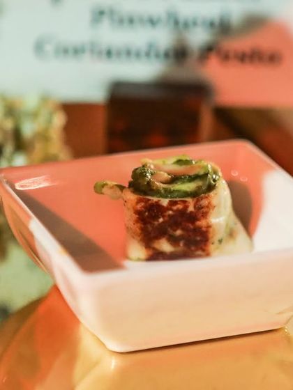 A pan-seared paneer roll with a flavourful filling. This bite-sized appetizer is an example of our contemporary Indian canapés, perfect for a sophisticated cocktail event.