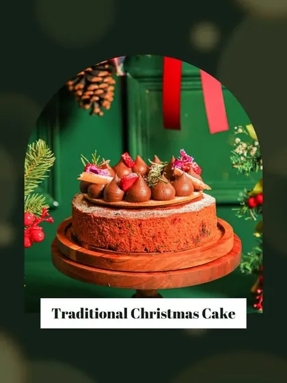 Our traditional Christmas Cake, a rich fruitcake beautifully decorated for the holidays.