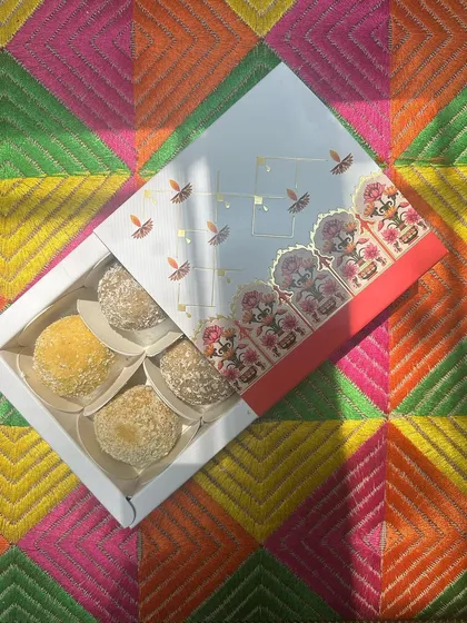 Our pet-friendly ladoos are a festive hit! This Mini Ladoo Box is packed with handmade, traditional-style sweets that let your dog safely join in on the Diwali mithai fun.