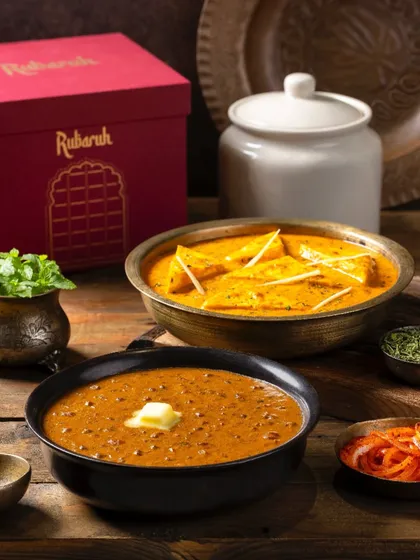 A combination shot of Dal-e-Rubaruh and Paneer-e-Rubaruh, presenting a complete vegetarian meal option for the brand.