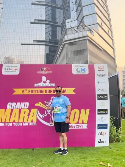 A member posing at the Grand Marathon event. We are proud to participate in well-organized races.