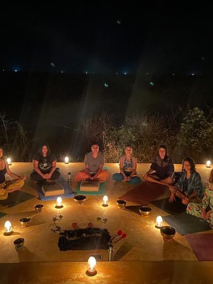 A candlelit sound healing session during the retreat, creating a space for deep relaxation and inner journeying.