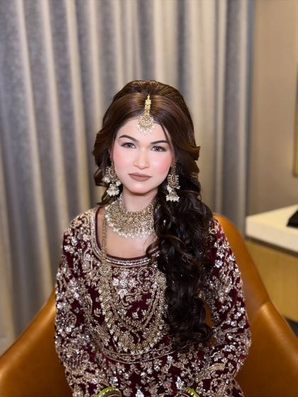 A beautiful portrait of Rashida. Her Walima makeup is sophisticated and glamorous, enhancing her natural beauty.