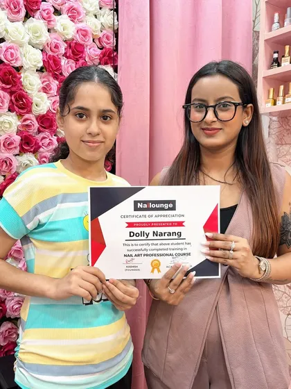 Presenting Dolly Narang with her certificate of appreciation. She has successfully completed her professional training and is ready for the industry.