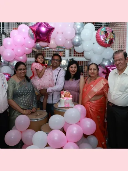 A beautiful family portrait from Vidhi's Barbie-themed birthday party.