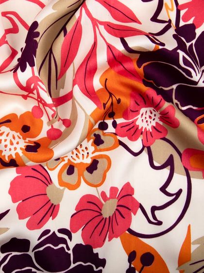 Another draped shot of the floral fabric, highlighting the interplay of colors.