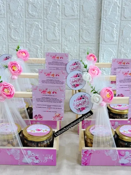 These charming baby girl announcement baskets are thoughtfully curated with treats and personalized notes to celebrate your new arrival.