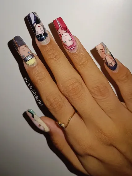 For all the anime lovers, this is a full set of hand-painted press-on nails inspired by the iconic characters from Naruto. Each nail features a different portrait, including Naruto, Hinata, Sakura, and Sasuke, bringing the entire team to your hands.